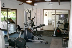 Exercise room in the pool area with A/C