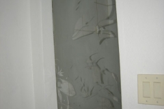 Custom etched window with tropical scene